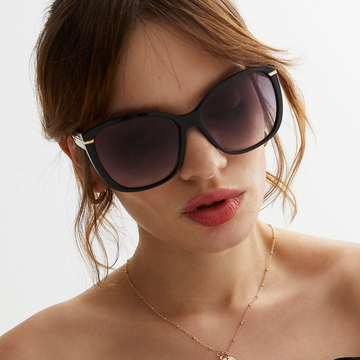 Women's oversized sunglasses with elegant plastic frame and protective UV filter Bowlift