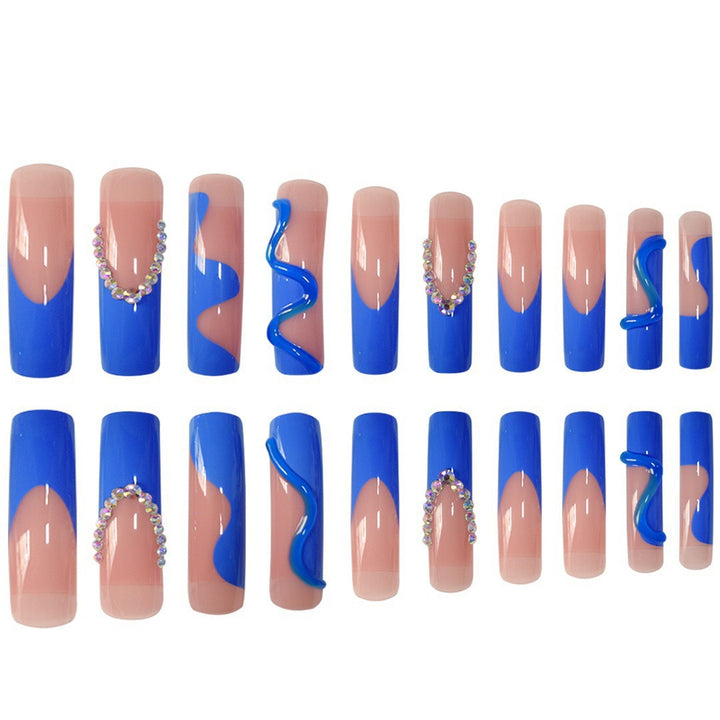 Creative Stiletto Nail Enhancements with Aqua-Gem Accents Bowlift