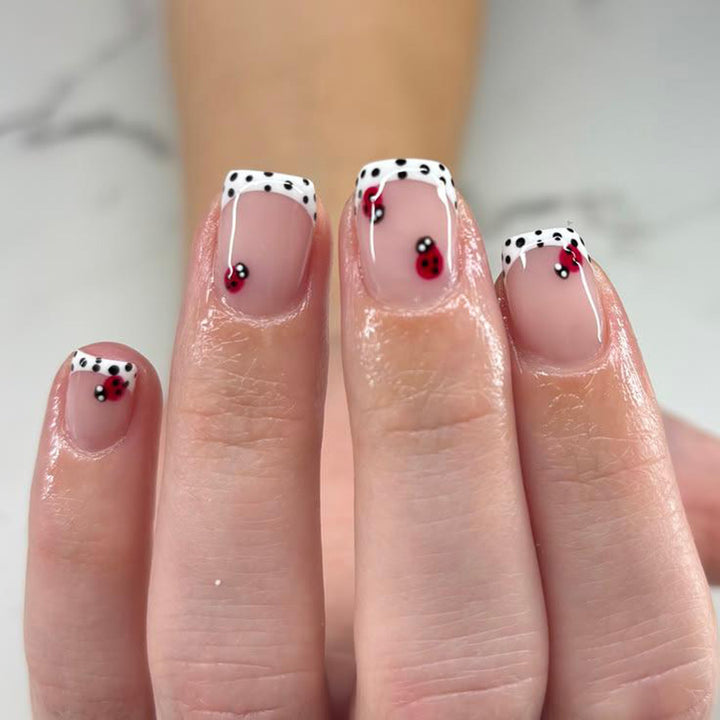 Elegant Artificial Nails with French Manicure and Glitter Effects Bowlift