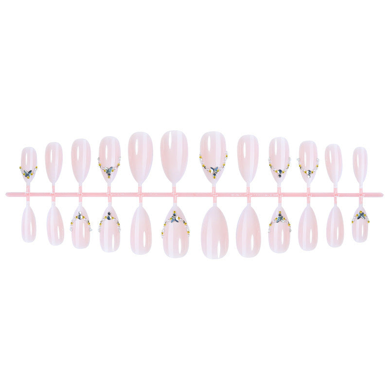 Acrylic nail set with elegant rhinestone decorations and glamorous designs Bowlift