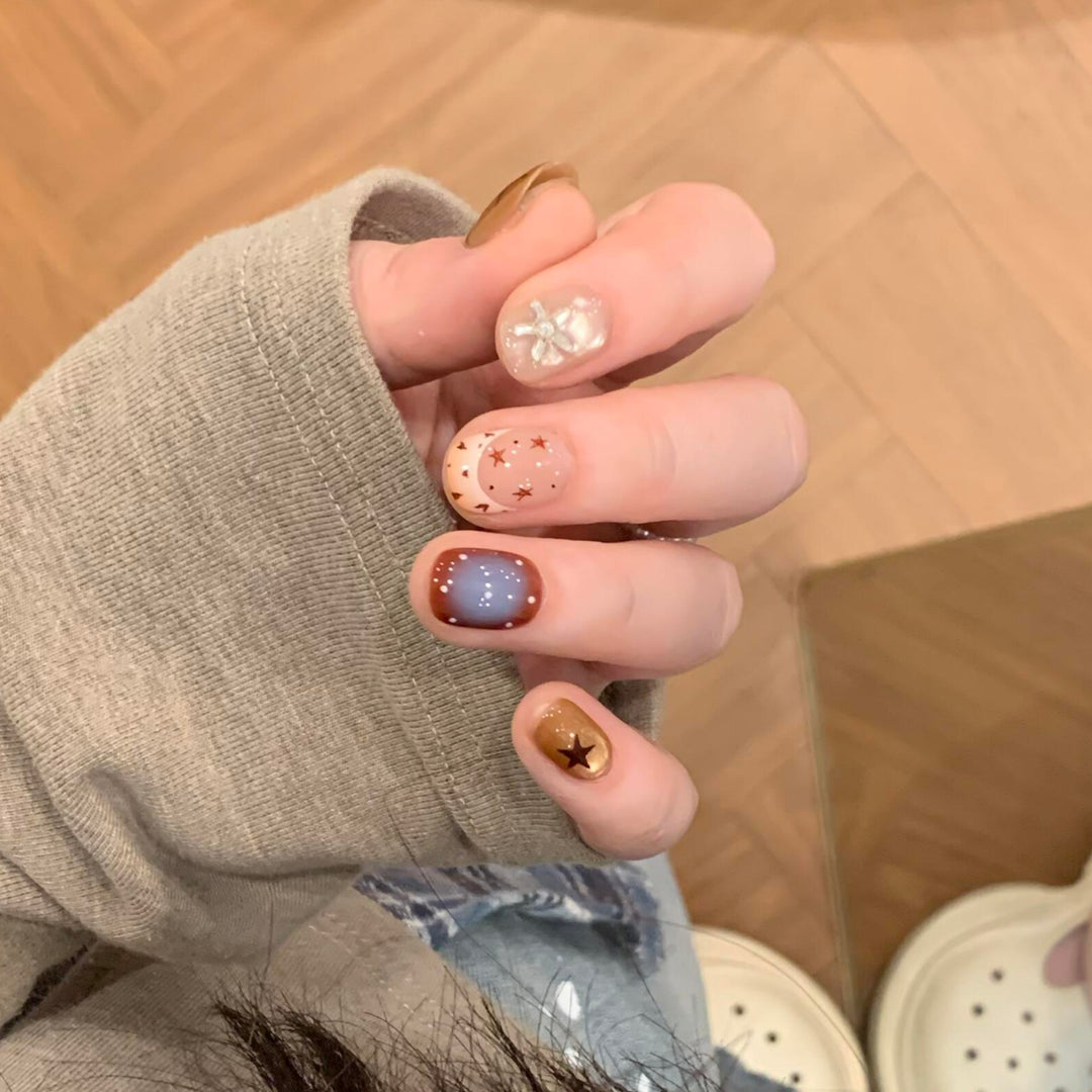 Artificial nails in modern design with star and gradient elements Bowlift