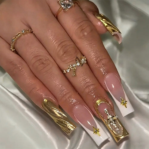 Acrylic nail set with elegant golden embellishments and glamorous accents Bowlift