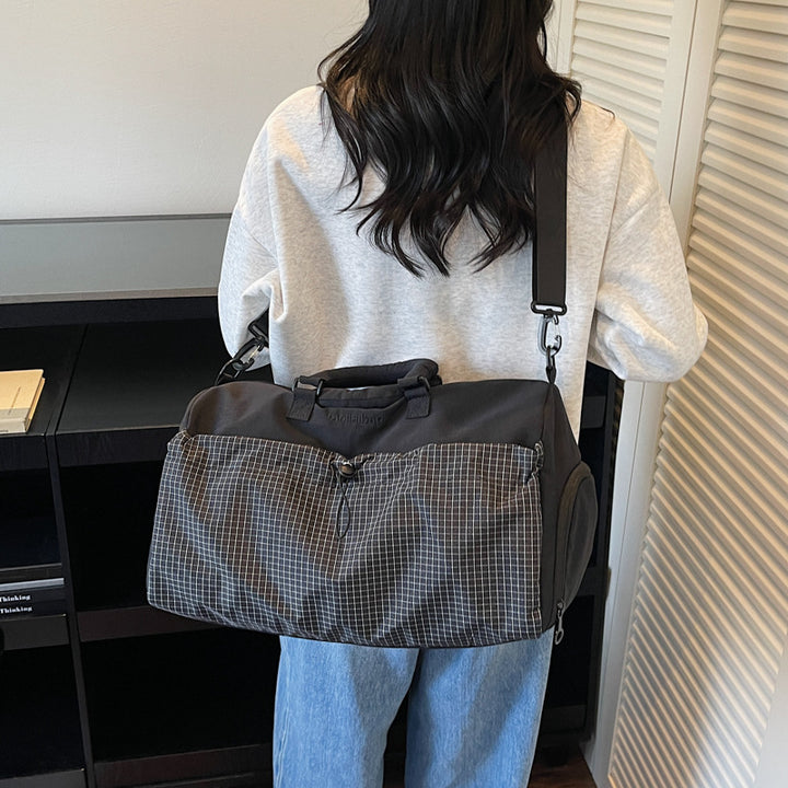Sporty travel bag with padded carrying handle Bowlift