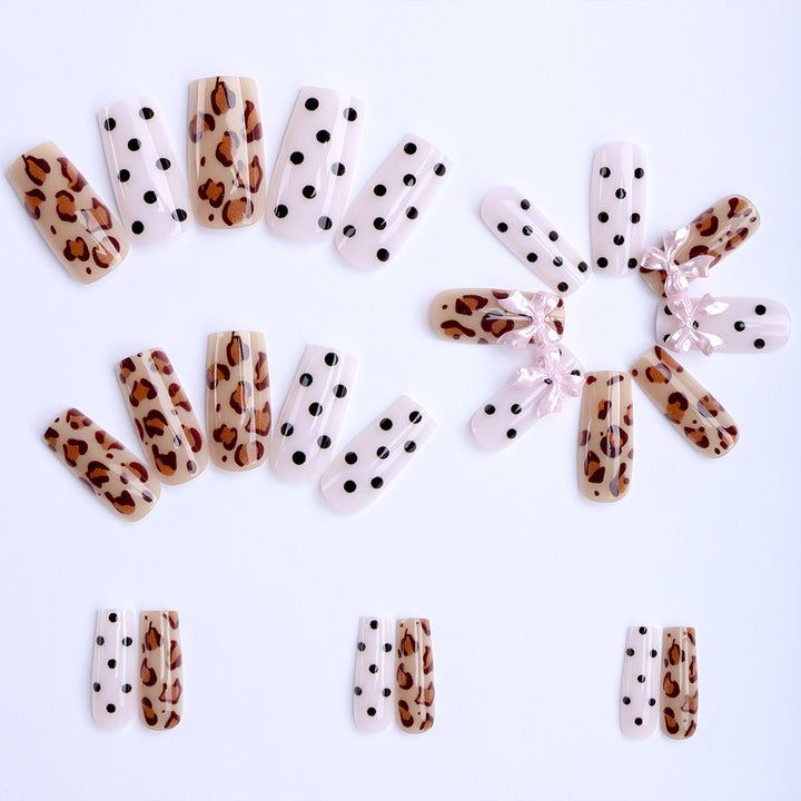 Creative artificial nails with bows and dots Bowlift
