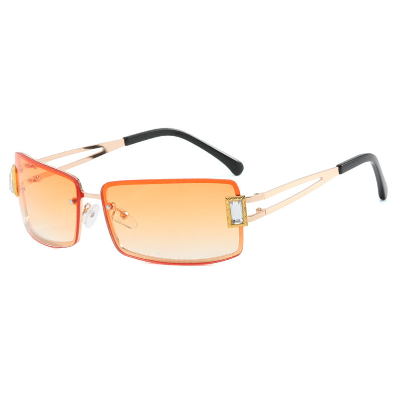 Ladies stylish sunglasses with elegant trapezoidal lenses and filigree metal frame Bowlift