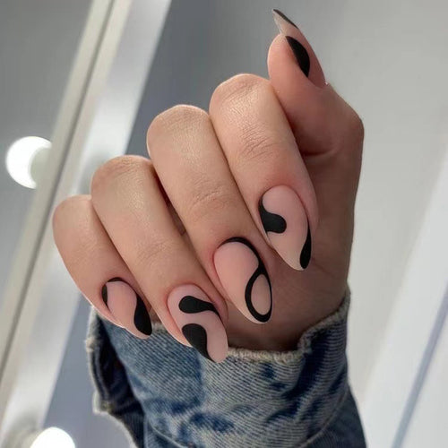 Artful Nail Art with Creative Black-and-White Design Bowlift