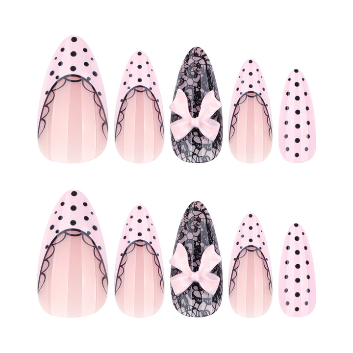 Elegant and artistic stiletto nails with tips and bows Bowlift