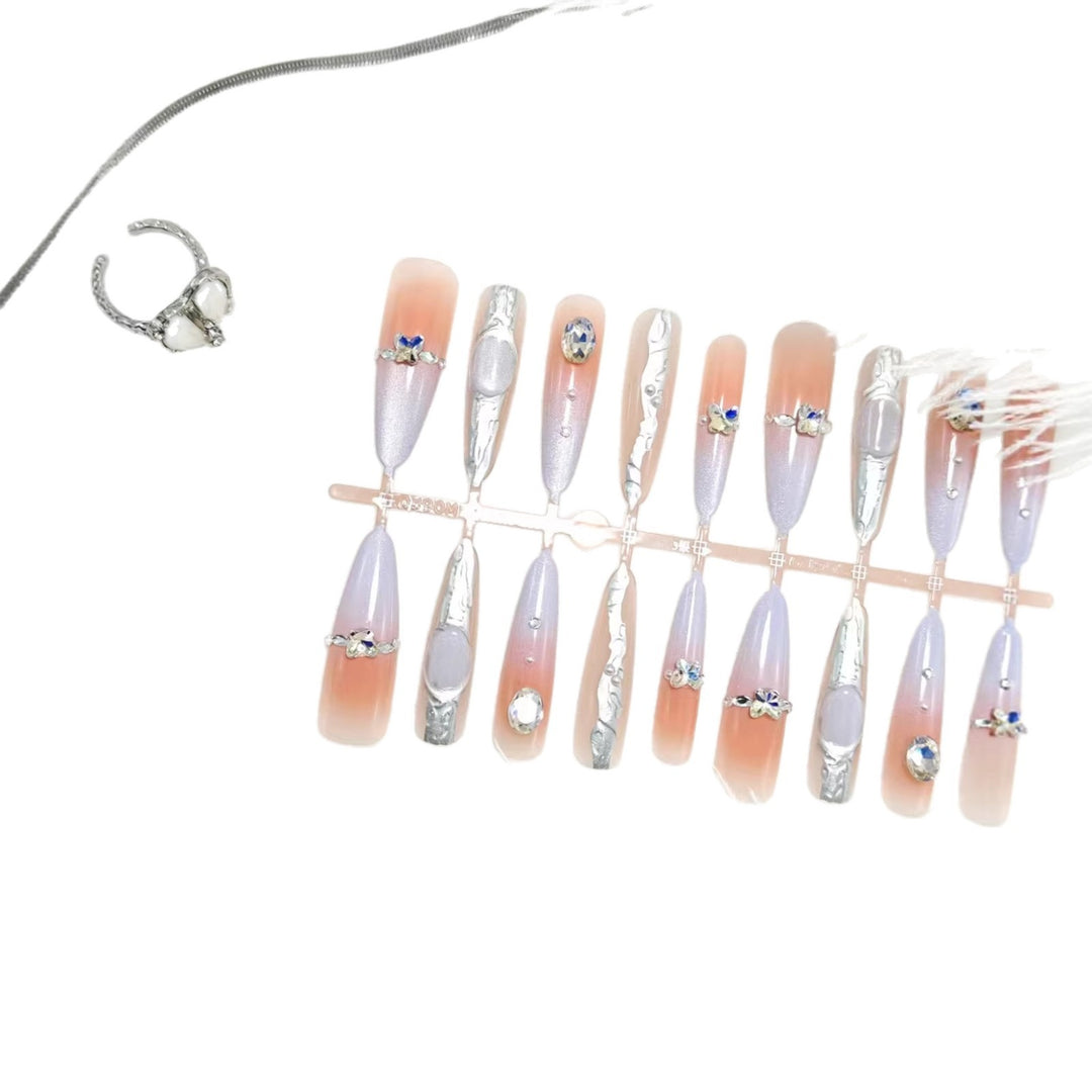 Artificial nails with elegant glitter and crystal accents Bowlift