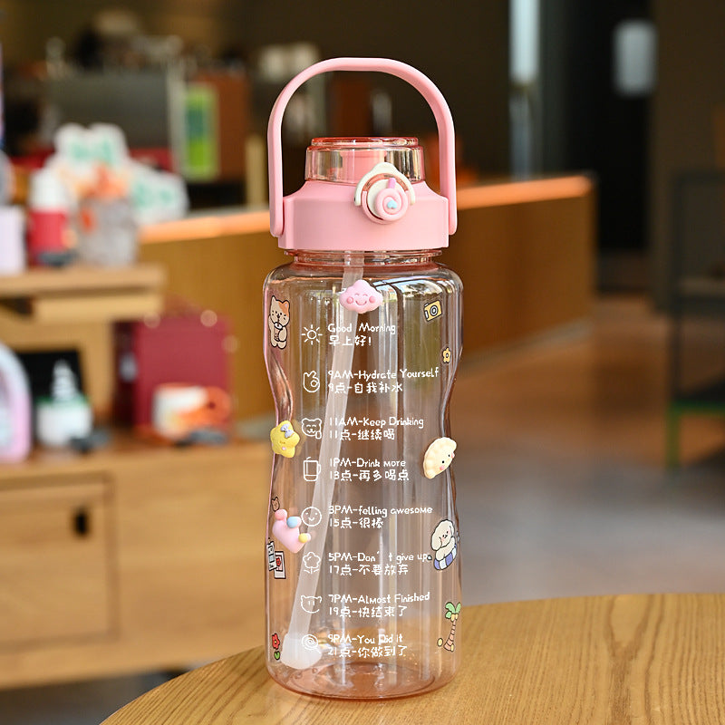 Women’s water bottle with integrated time marking and practical carrying handle Bowlift