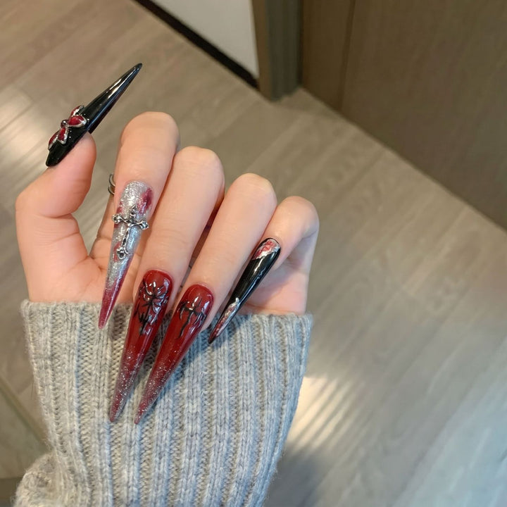 Artistic Stiletto Press-On Nail Set with Unique Gothic Design Elements Bowlift