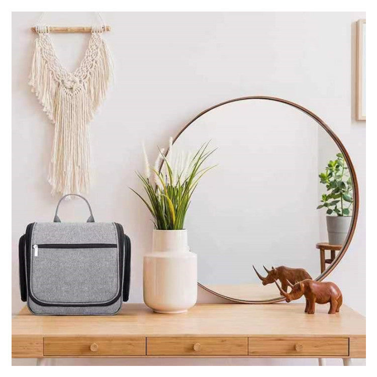 Elegant cosmetic bag with hanging hook and versatile compartments Bowlift