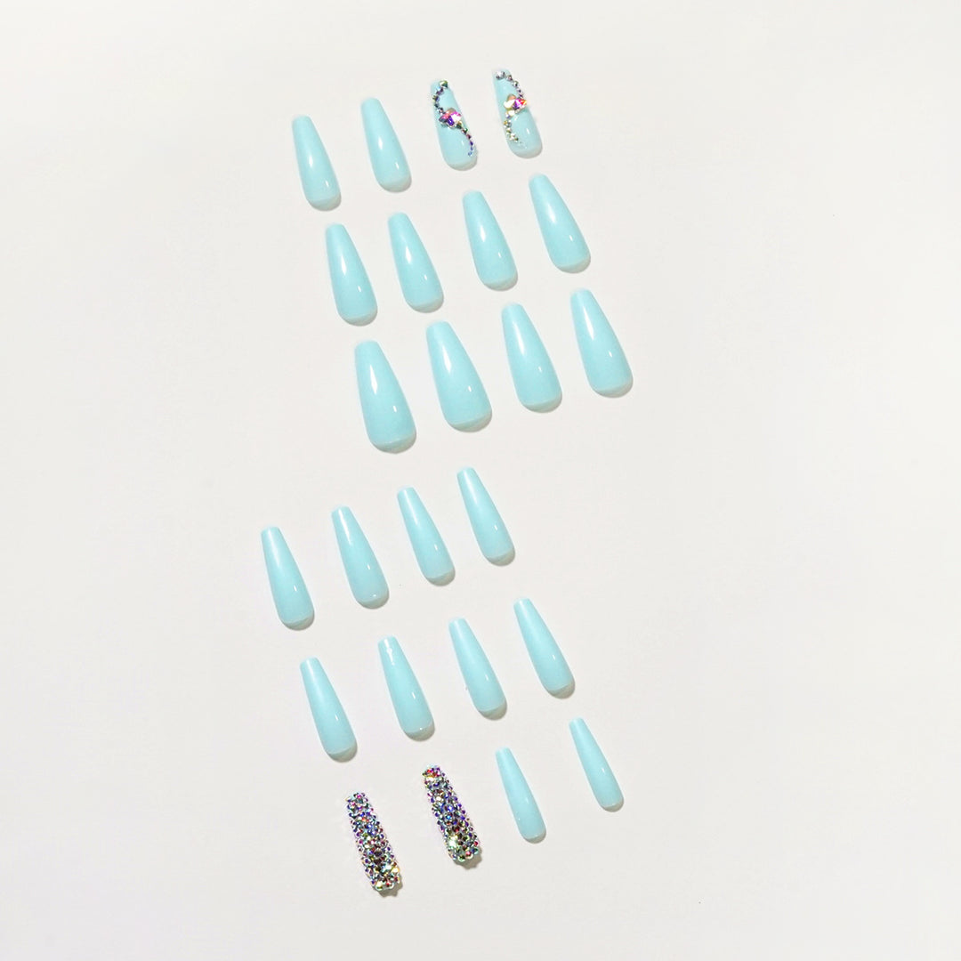 Glamorous artificial nails with sparkling rhinestone embellishments Bowlift