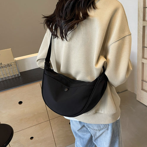Shoulder bag with adjustable strap and multiple compartments Bowlift
