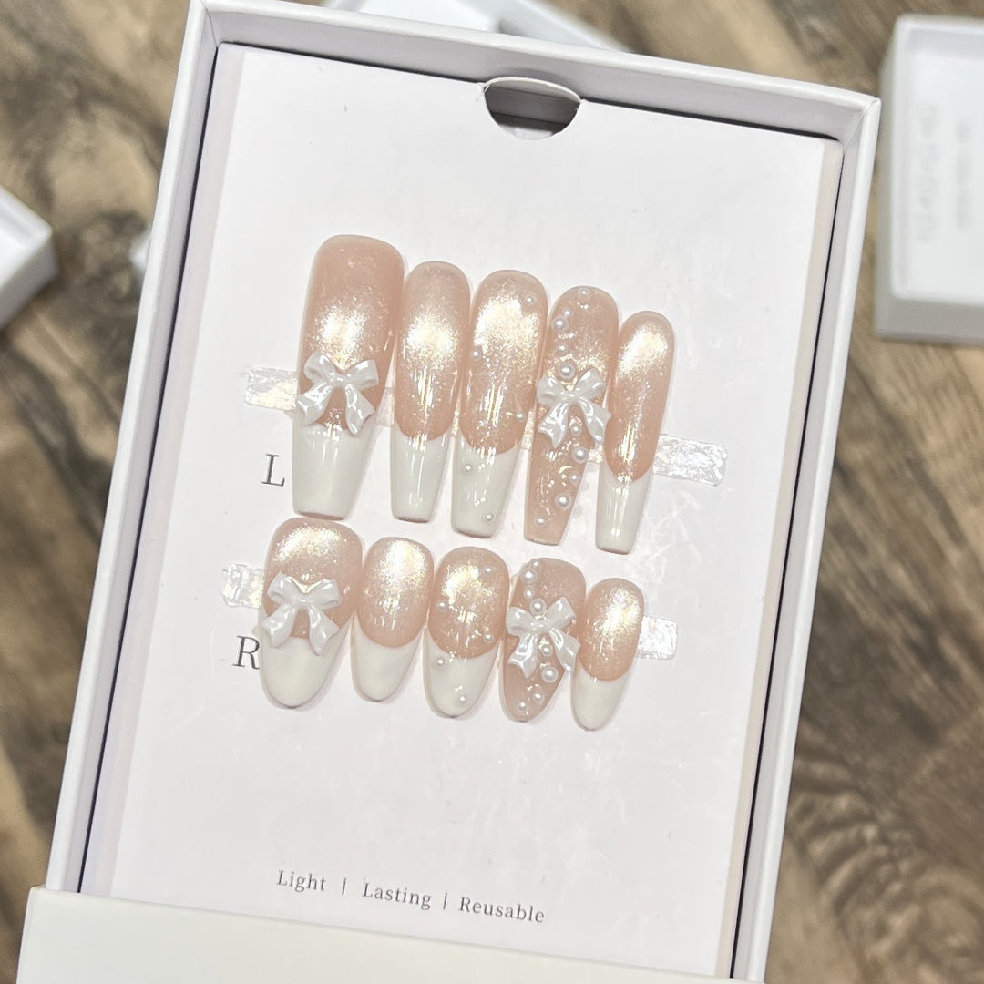 Decorative Long Press-On Nail Set with Bow and Pearl Accents Bowlift