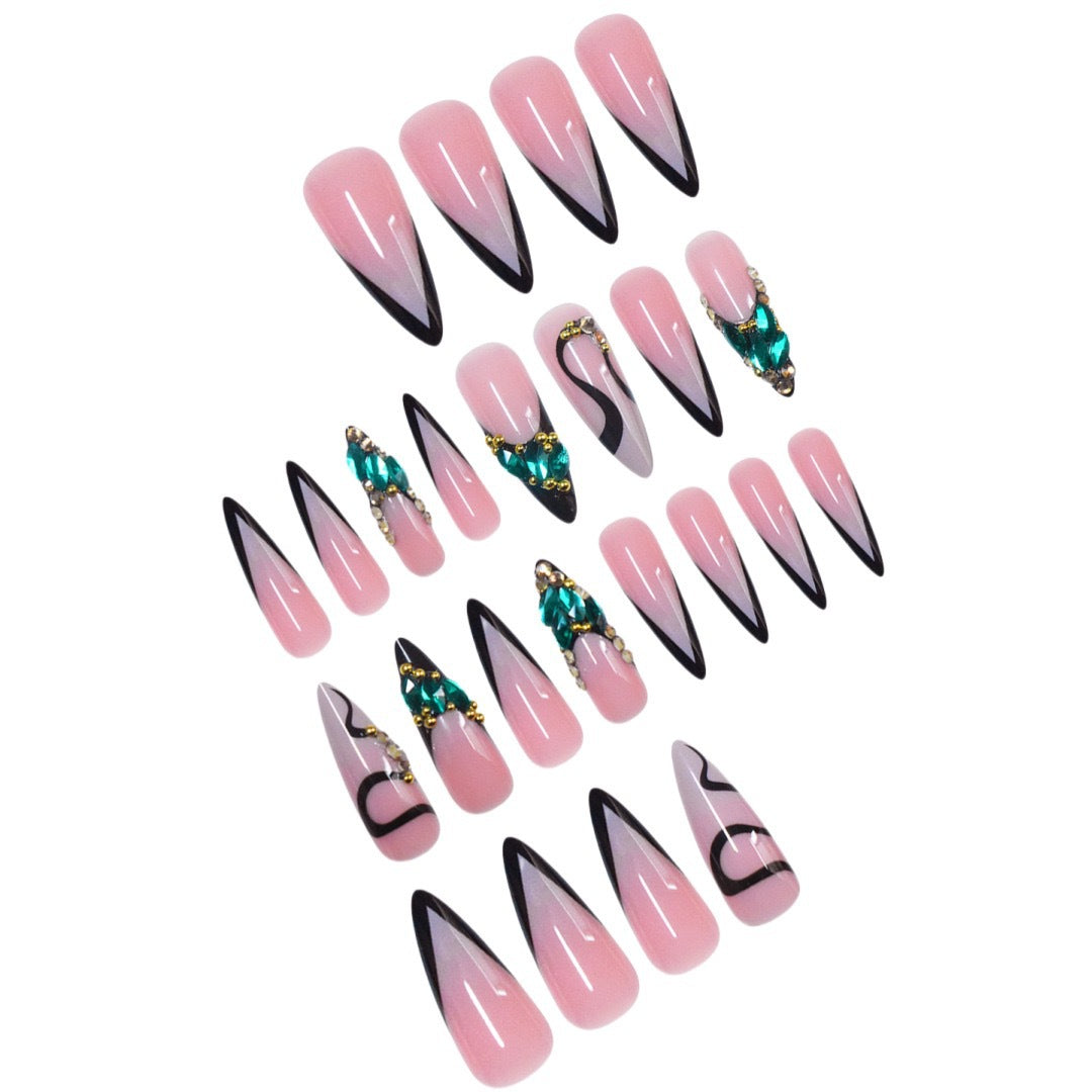 Elegant Stiletto Nail Enhancements with Gem Accents Bowlift