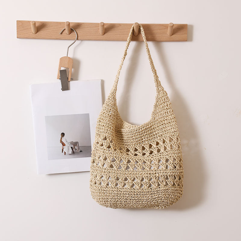 Crocheted shoulder bag with decorative hole pattern Bowlift