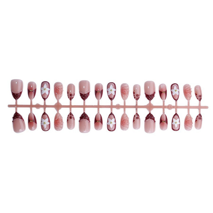Artificial nail set with floral 3D applications and elegant gradient design Bowlift