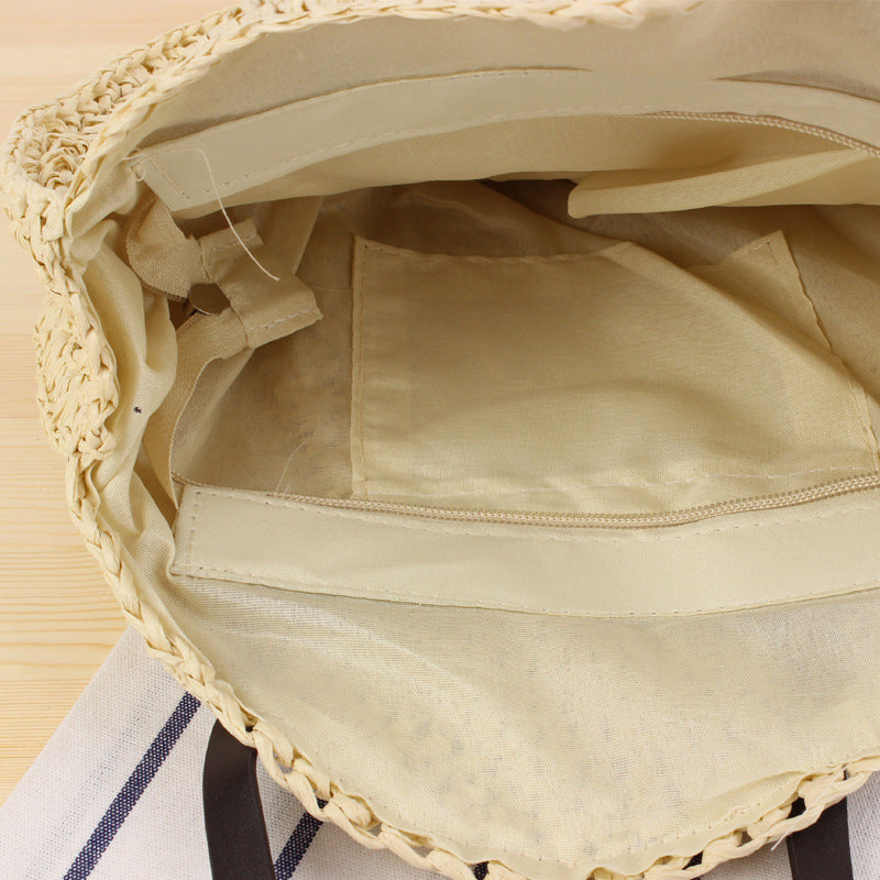 Round basket bag with sturdy leather handles Bowlift