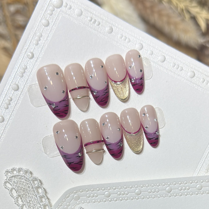 Artistic Stiletto Press-On Nail Set with Rhinestone Accents Bowlift