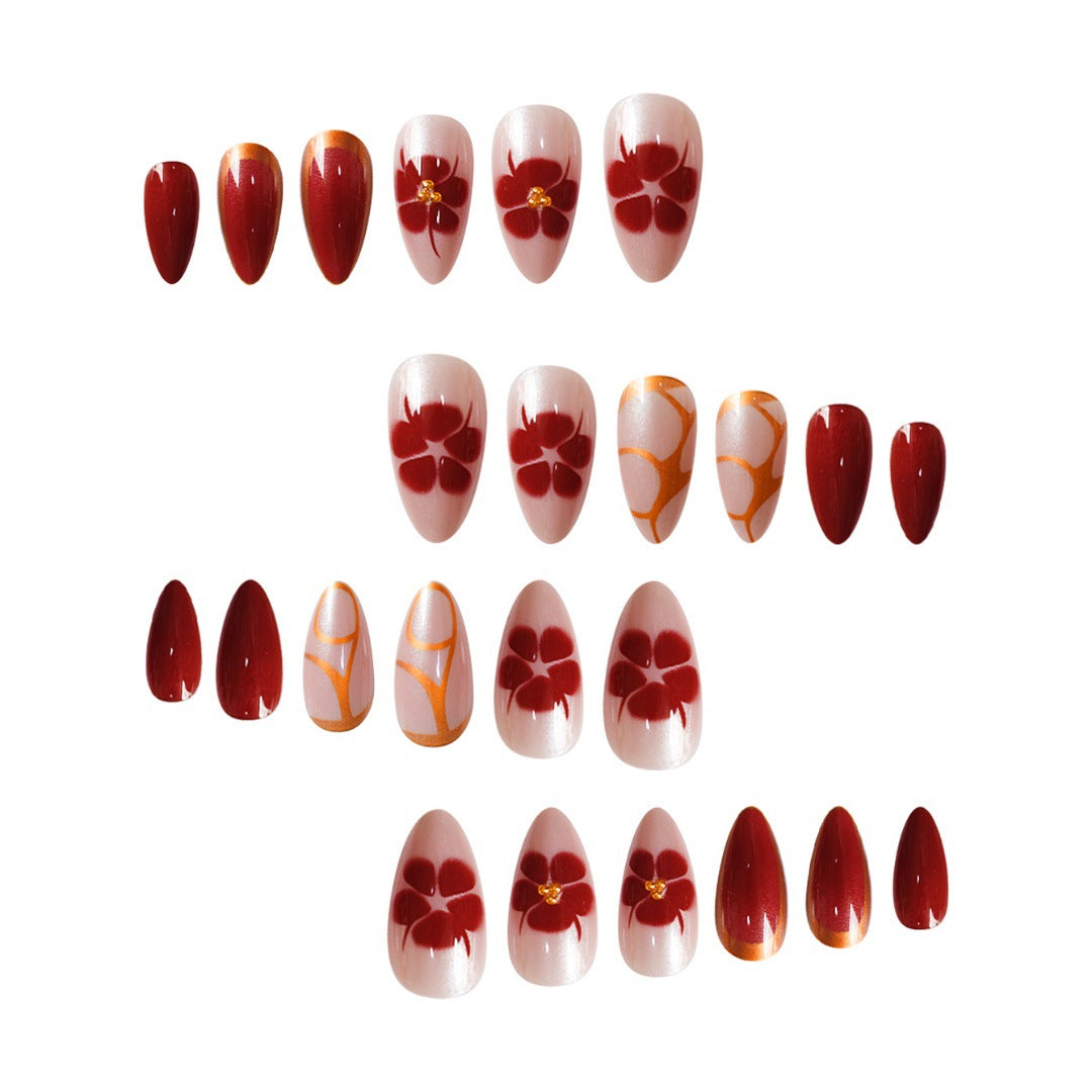 Artistic Press-On Nail Art Set with Floral Accents Bowlift