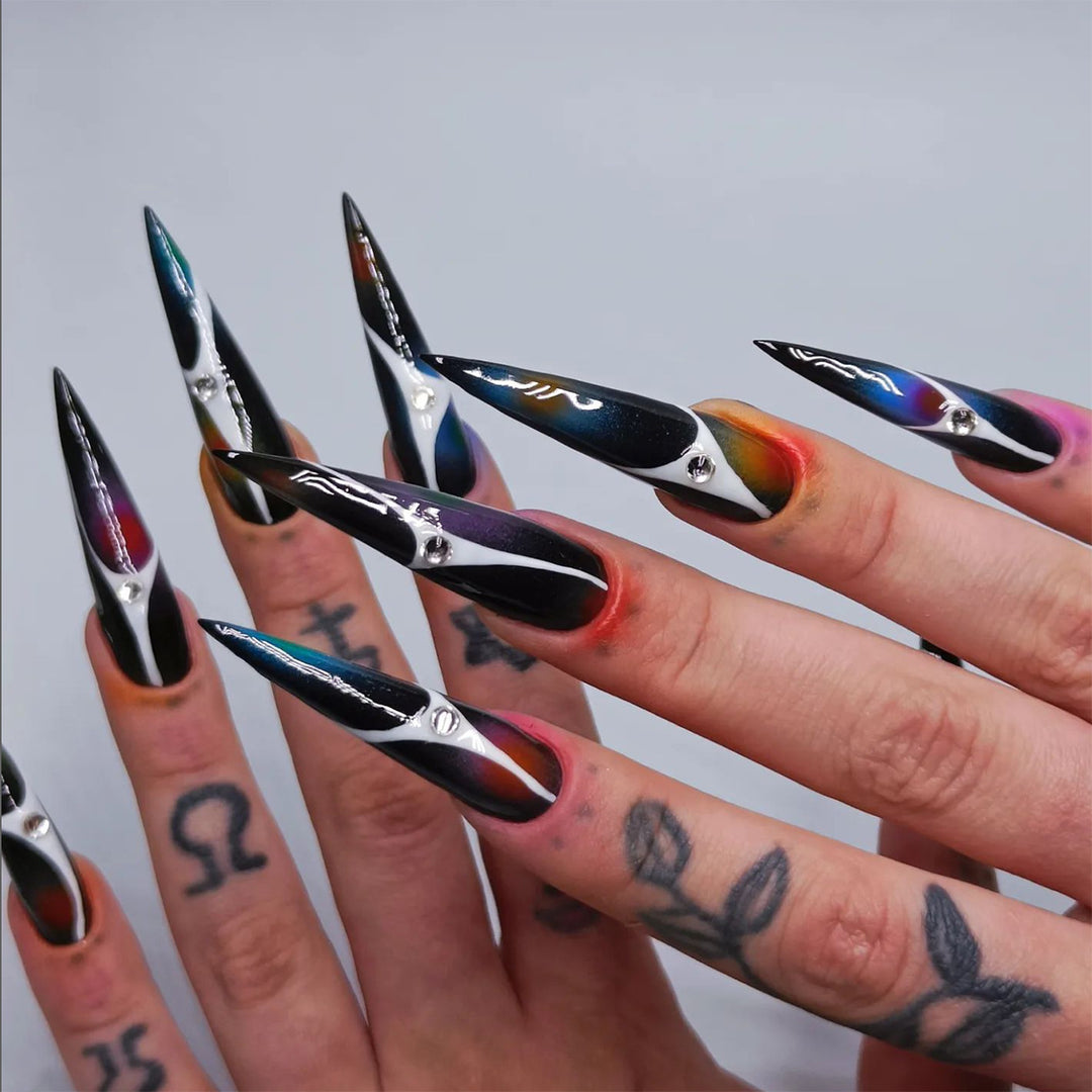 Artful stiletto nails with sparkling accents and geometric design Bowlift