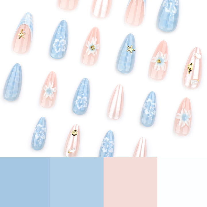 Artful nail extensions with delicate floral designs and glitter accents Bowlift