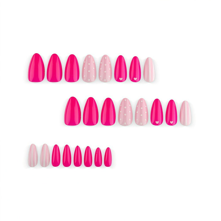 Artificial nails in playful design with hearts and dots Bowlift