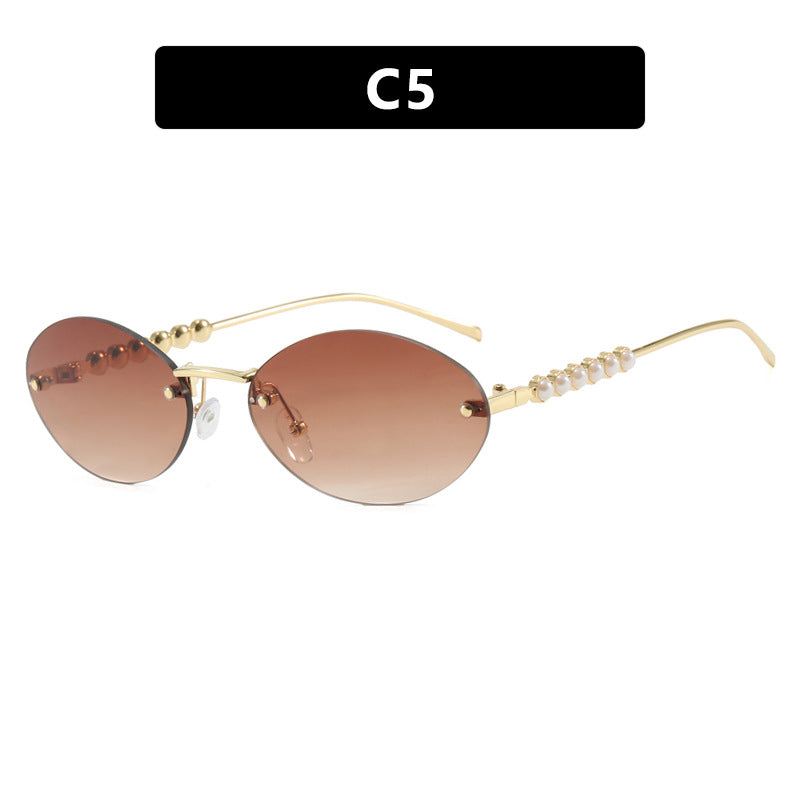 Women's stylish oval sunglasses with elegant embellishments Bowlift