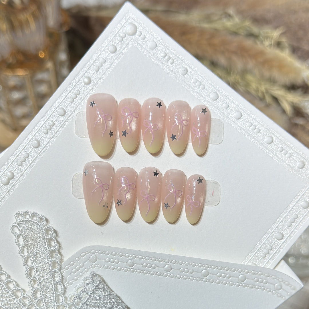 Press-On Nail Set with Bow and Star Accents Bowlift