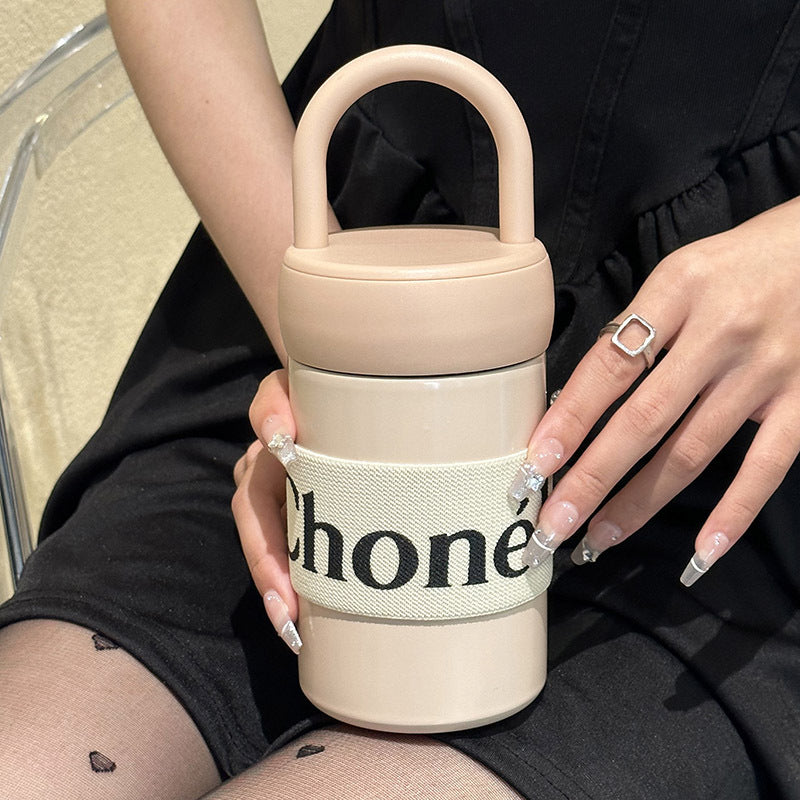 Women's multifunctional thermos cup with practical carrying handle Bowlift