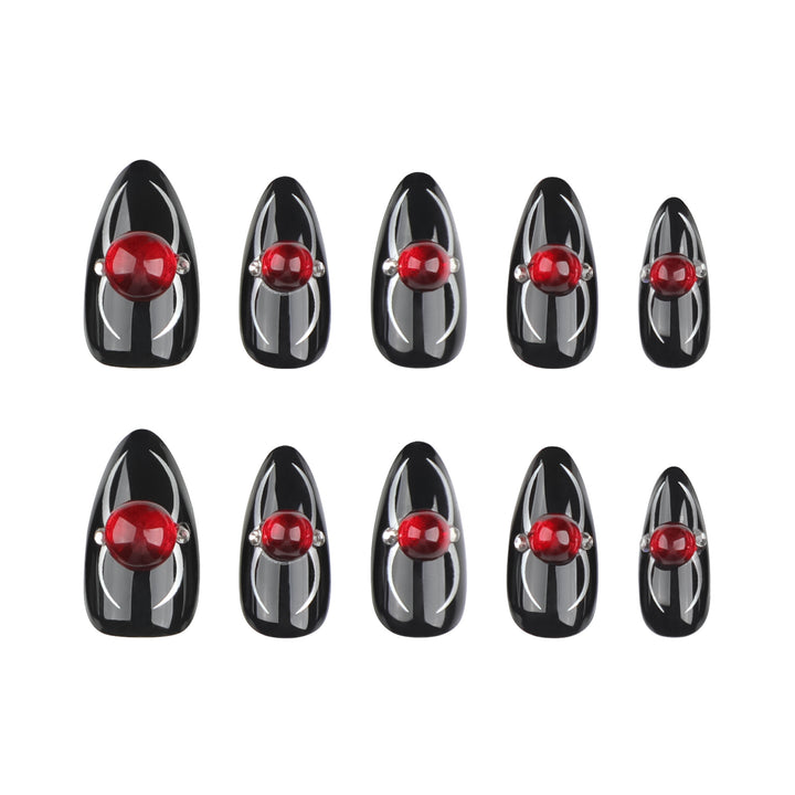 Glamorous stiletto nails with radiant accents Bowlift