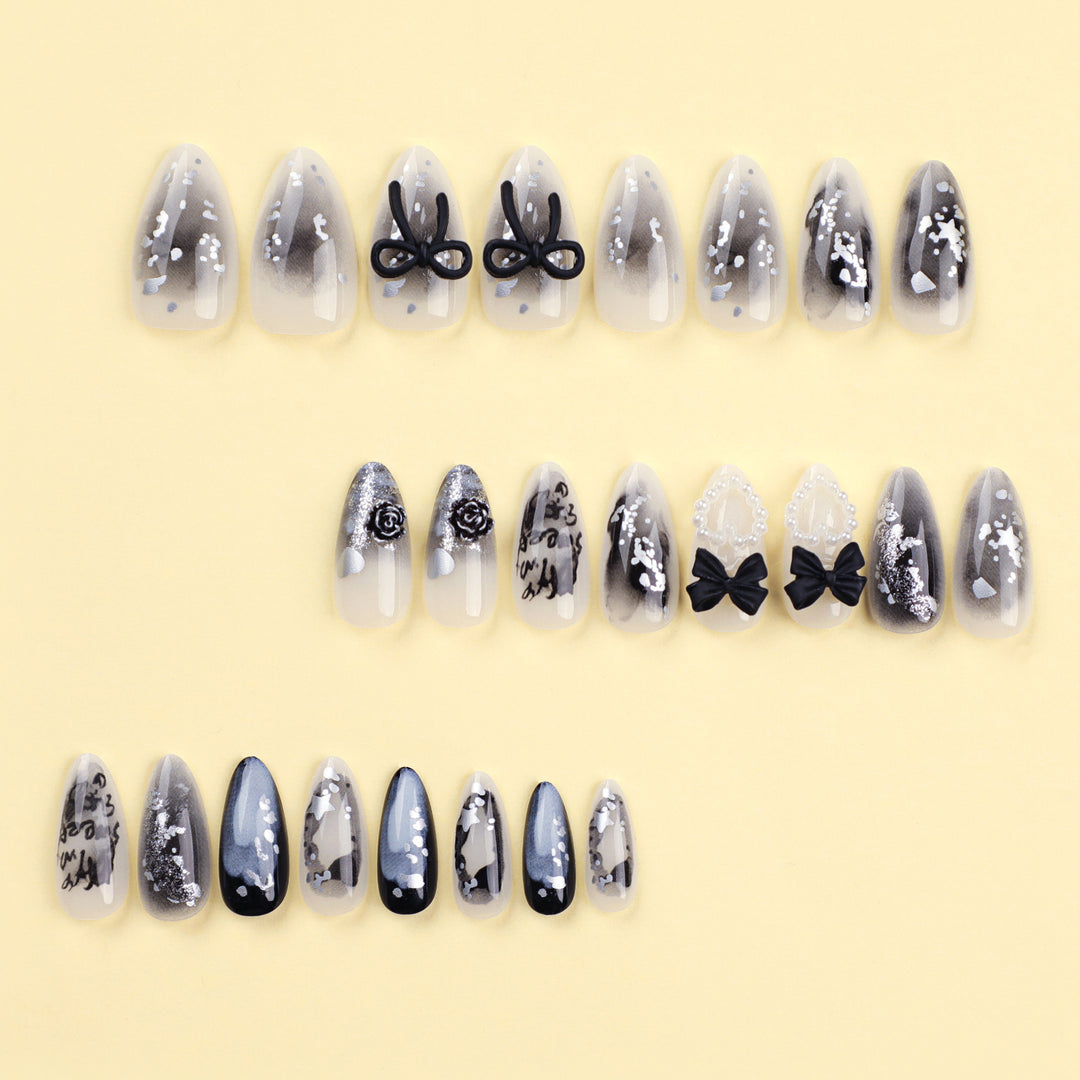 Artificial nail art with unique black and white design Bowlift