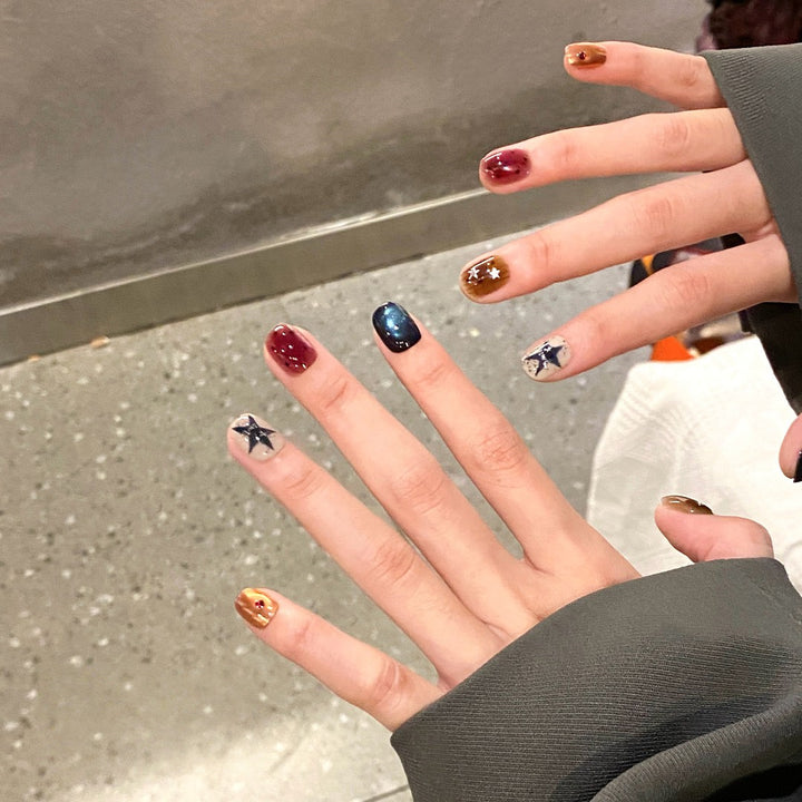 Artificial nails with sparkling star design Bowlift