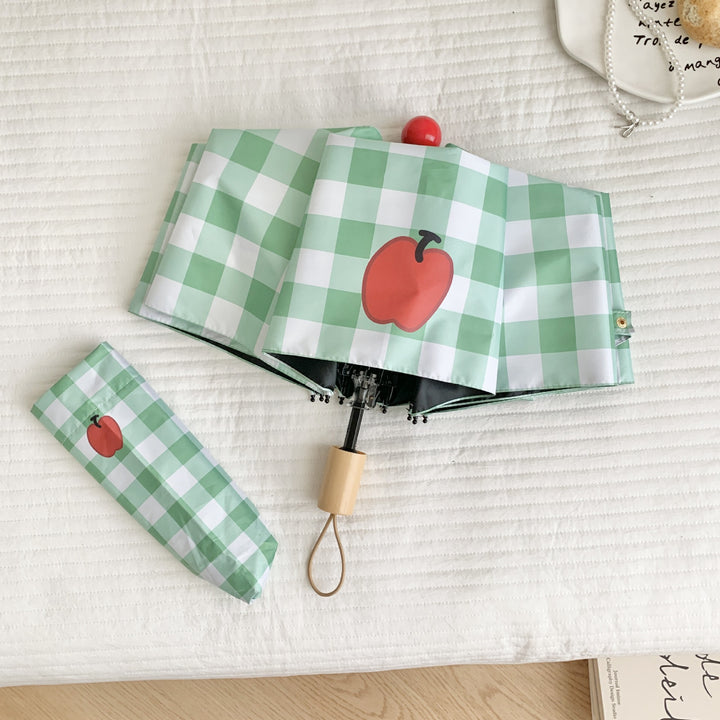 Ladies' folding umbrella in stylish check pattern with fruity motif Bowlift