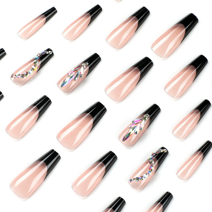 Artistic stiletto nails with glitter embellishments Bowlift