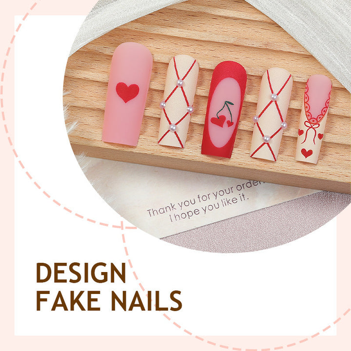 Art nail set with romantic heart and cherry motifs Bowlift