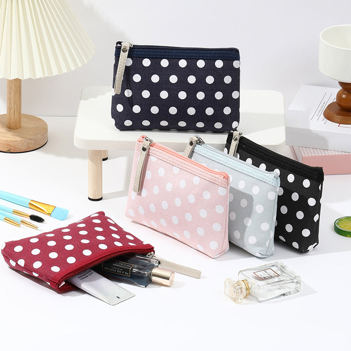 Polka dot canvas cosmetic pouch with top zipper and leather pull Bowlift