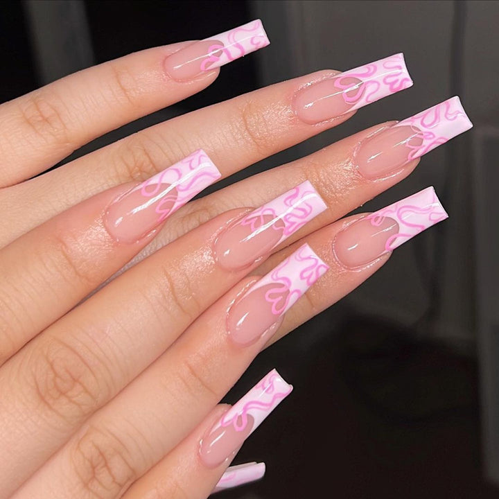 Artistic Long Press-On Nails with Heart Design Bowlift