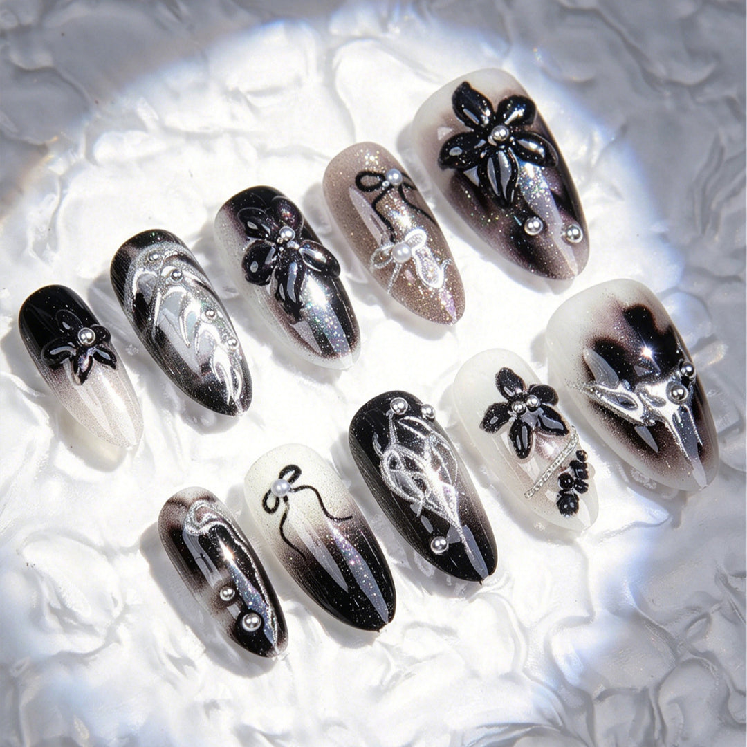 Elegant acrylic nail set with complex designs Bowlift