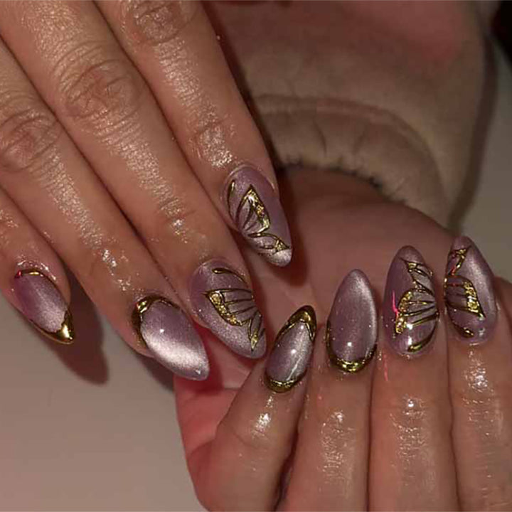 Artful Nail Extensions with Golden Accents Bowlift
