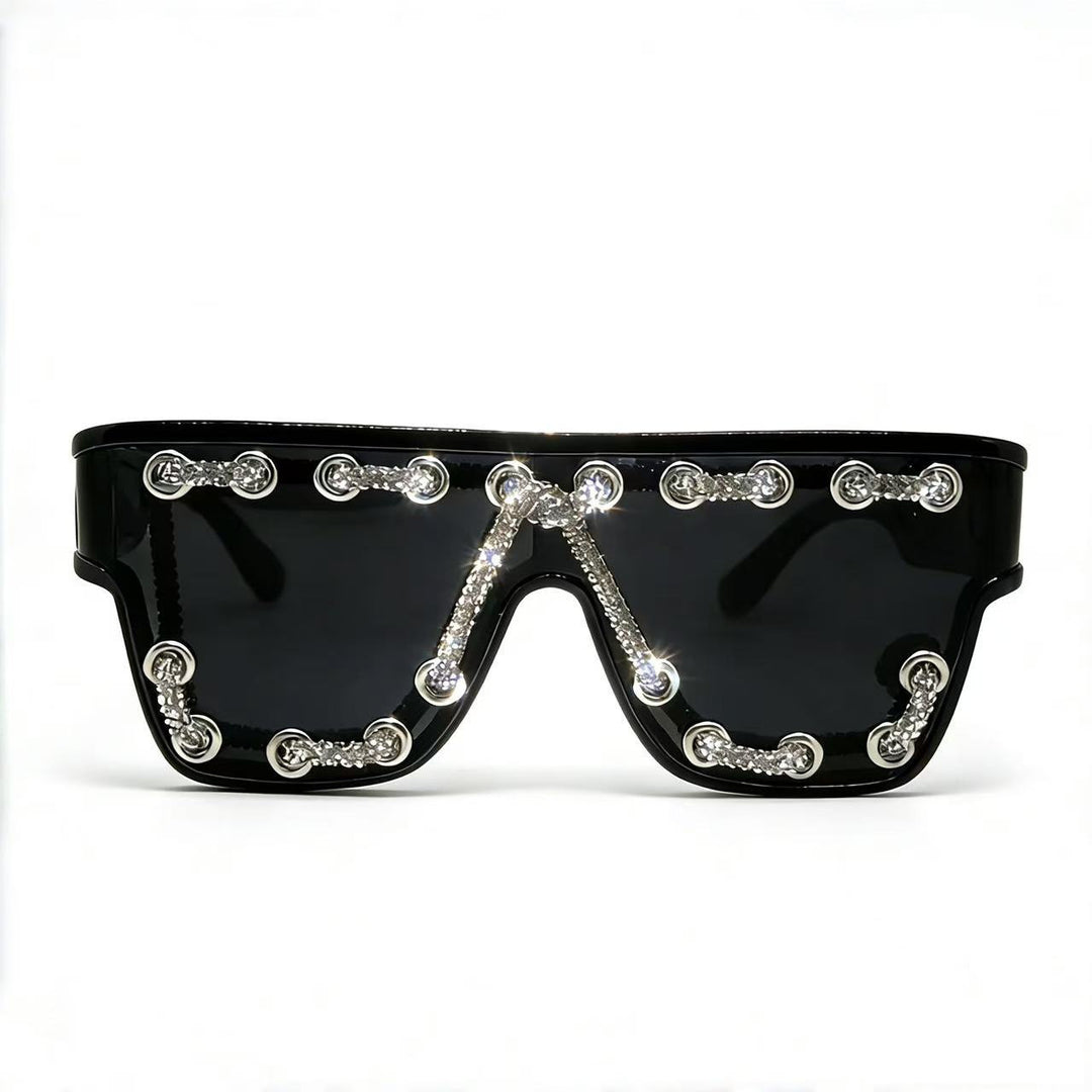 Ladies sunglasses with extravagant design and decorative chain embellishment Bowlift