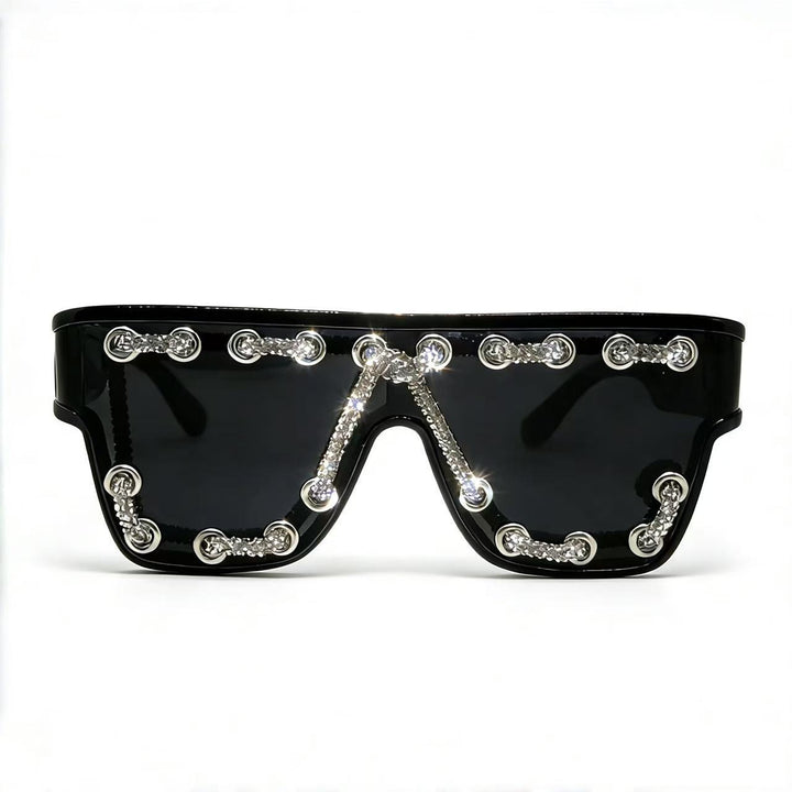 Ladies sunglasses with extravagant design and decorative chain embellishment Bowlift