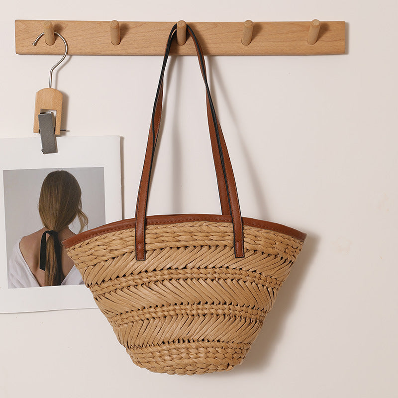 Braided basket bag with innovative leather handles Bowlift