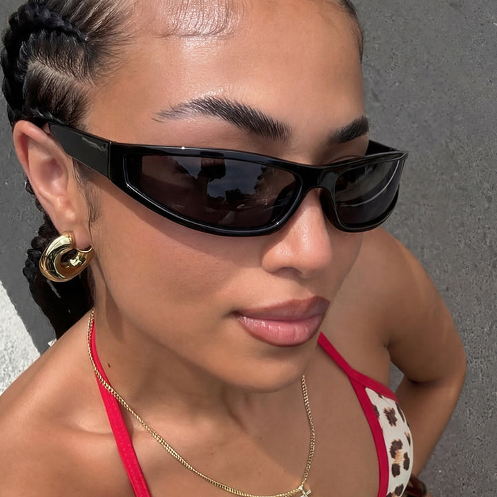 Women's sporty sunglasses with flat, aerodynamic design and UV protection Bowlift
