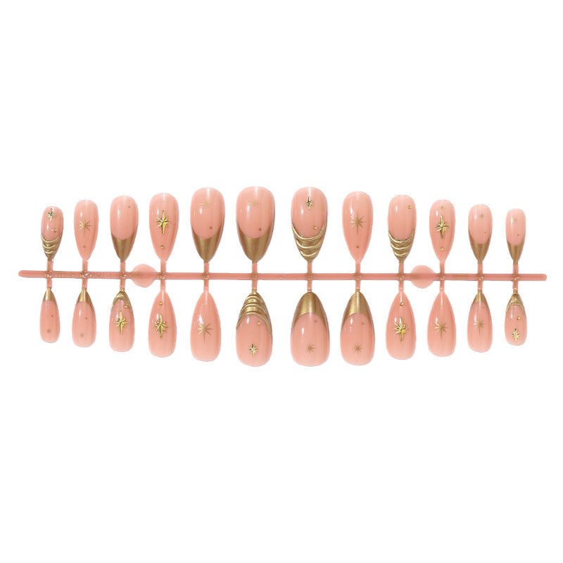 Artificial nail set with elegant golden accents and sparkling stars Bowlift