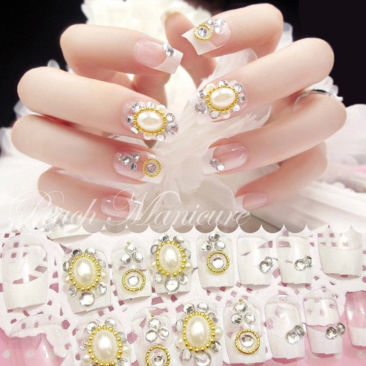 Artificial nails with elegant flower and rhinestone design Bowlift