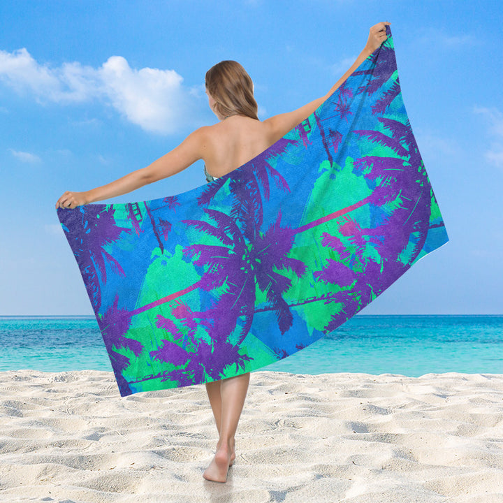 Women's beach towel with vibrant palm motif Bowlift