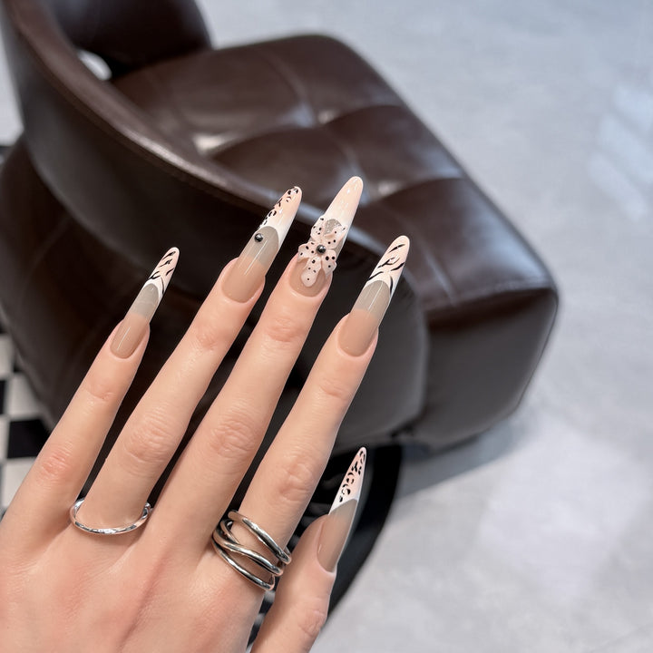 Artistic Stiletto Nail Art Set with Elegant Decorative Elements Bowlift