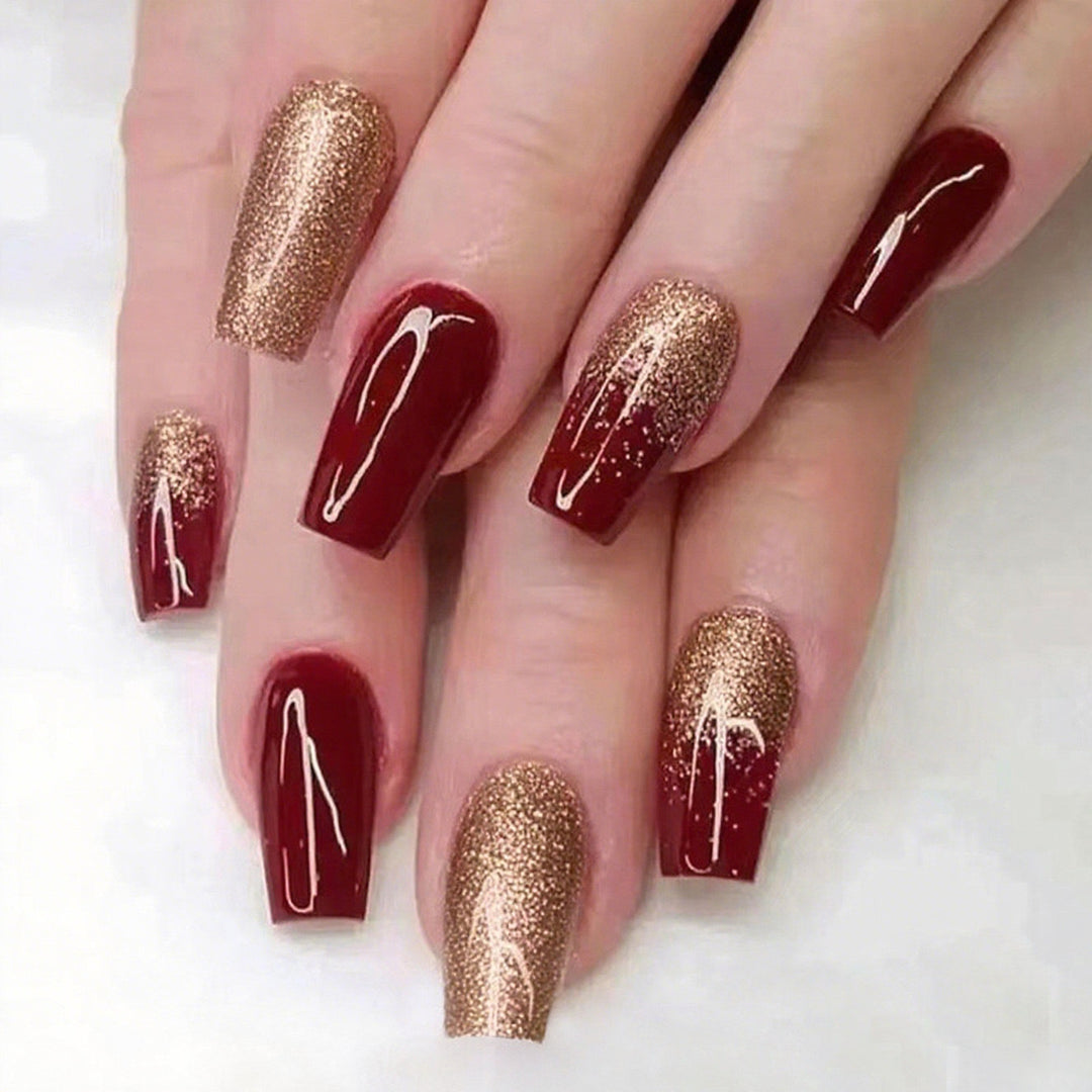 Glamorous artificial nails with glitter and elegant embellishments Bowlift