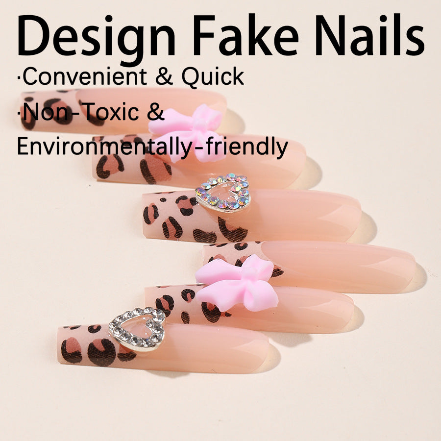 Creative nail set with leopard pattern and bow accents Bowlift